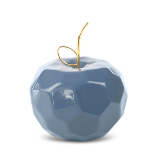 Figurka dekoracyjna granatowa w kształcie jabłka.